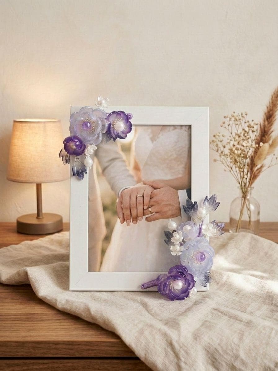 Purple glass floral frame holding a wedding photo