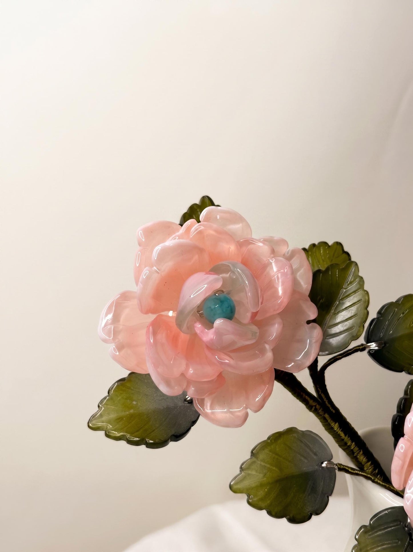 Close-up of a translucent pink glass rose