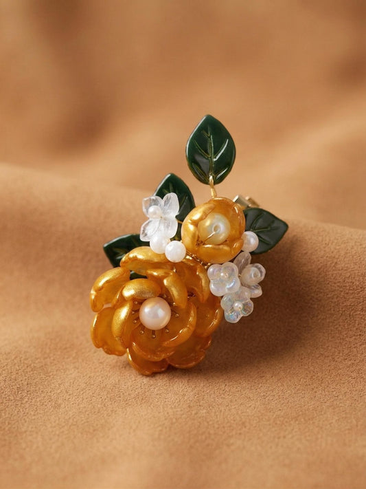 Yellow glass flower hair clip with pearl centres, handmade in Sydney