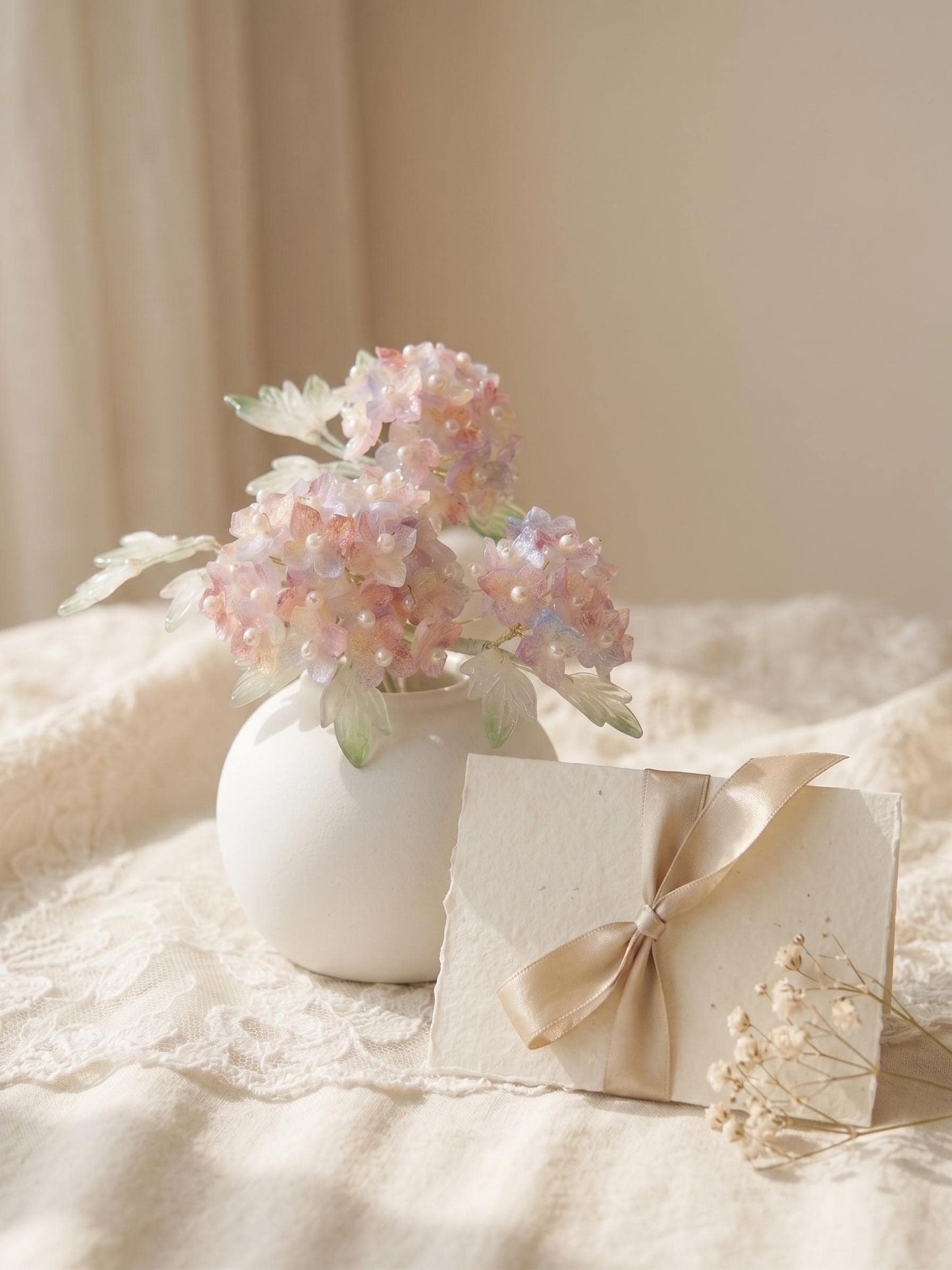 Pink hydrangea glass vase styled as a gift