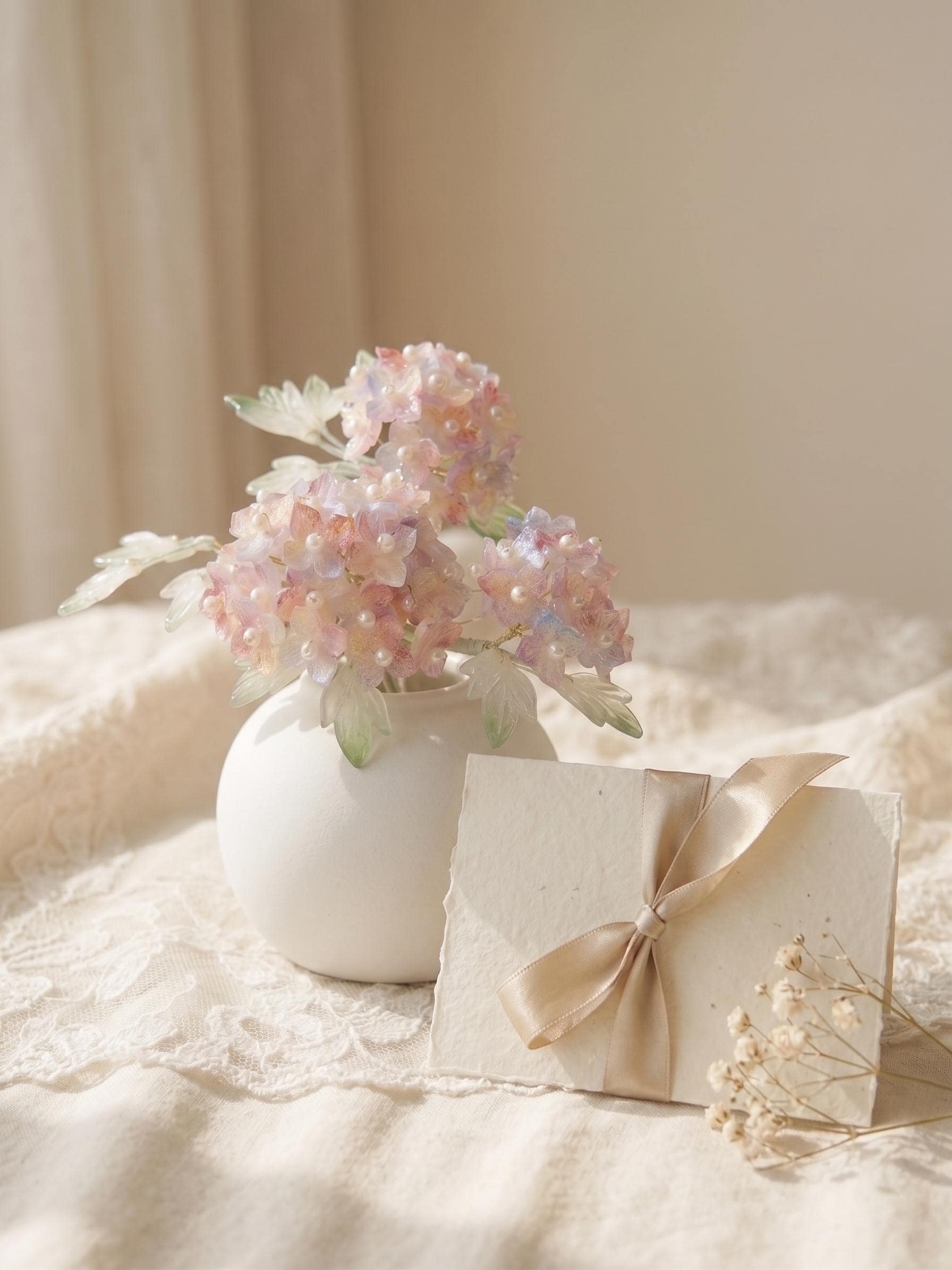 Pink hydrangea glass vase styled as a gift