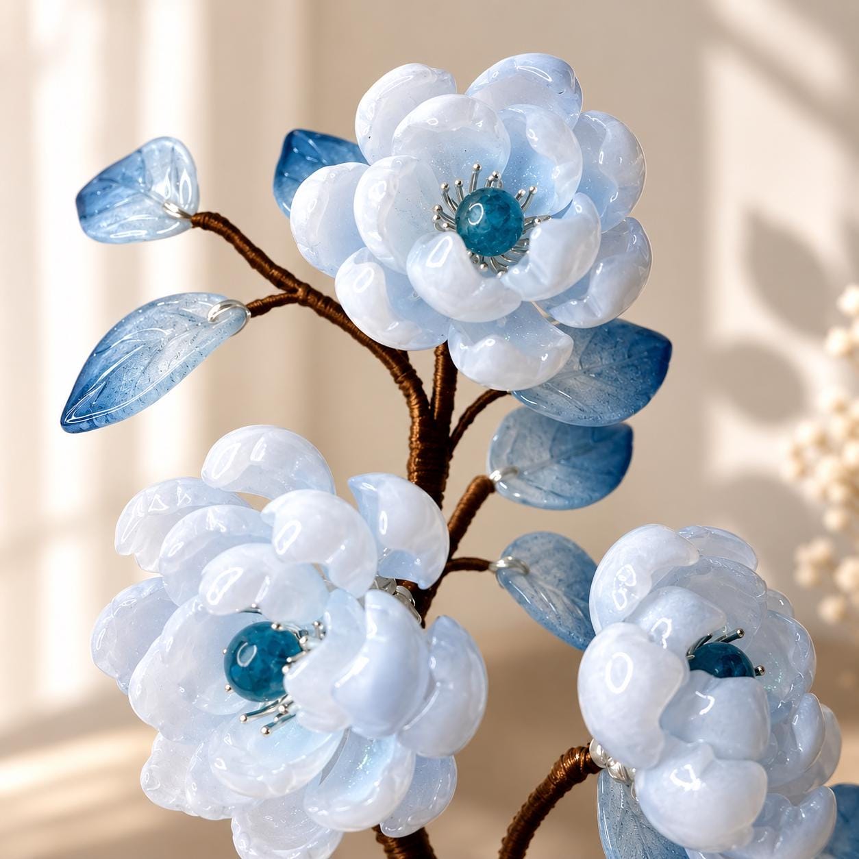 Blue glass flowers and translucent leaves detail