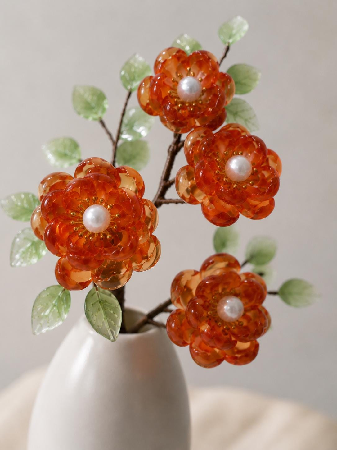 Red glass flowers with pearl centres