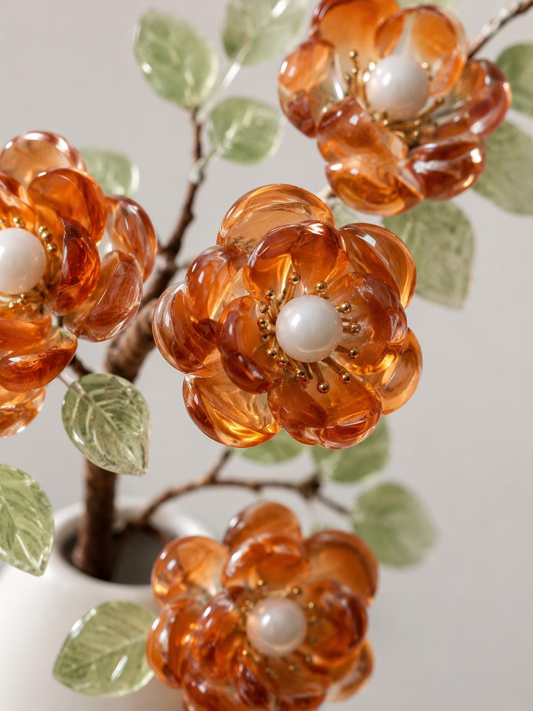 Amber-red glass flower close up