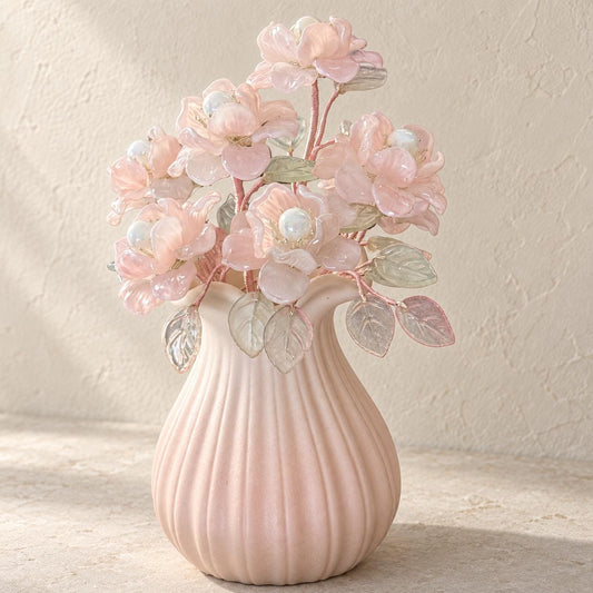 Pink glass camellia bouquet in a ribbed pale-pink ceramic vase, made in Sydney