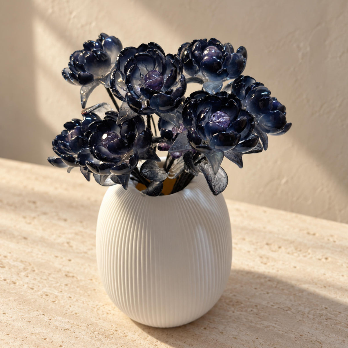 Black glass flowers with dark navy and violet translucency
