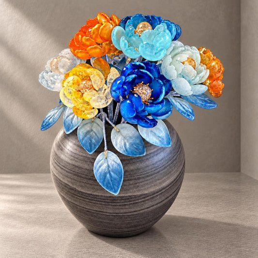 Blue Hour glass flower arrangement in charcoal ceramic vase