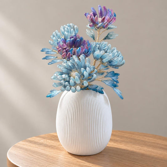 Indigo Hush blue and purple glass chrysanthemums in white ribbed vase